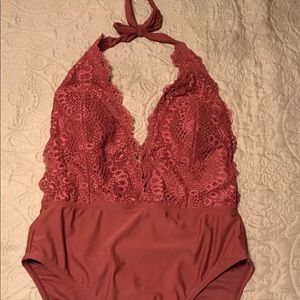 Xhiliration women’s size Large one piece .